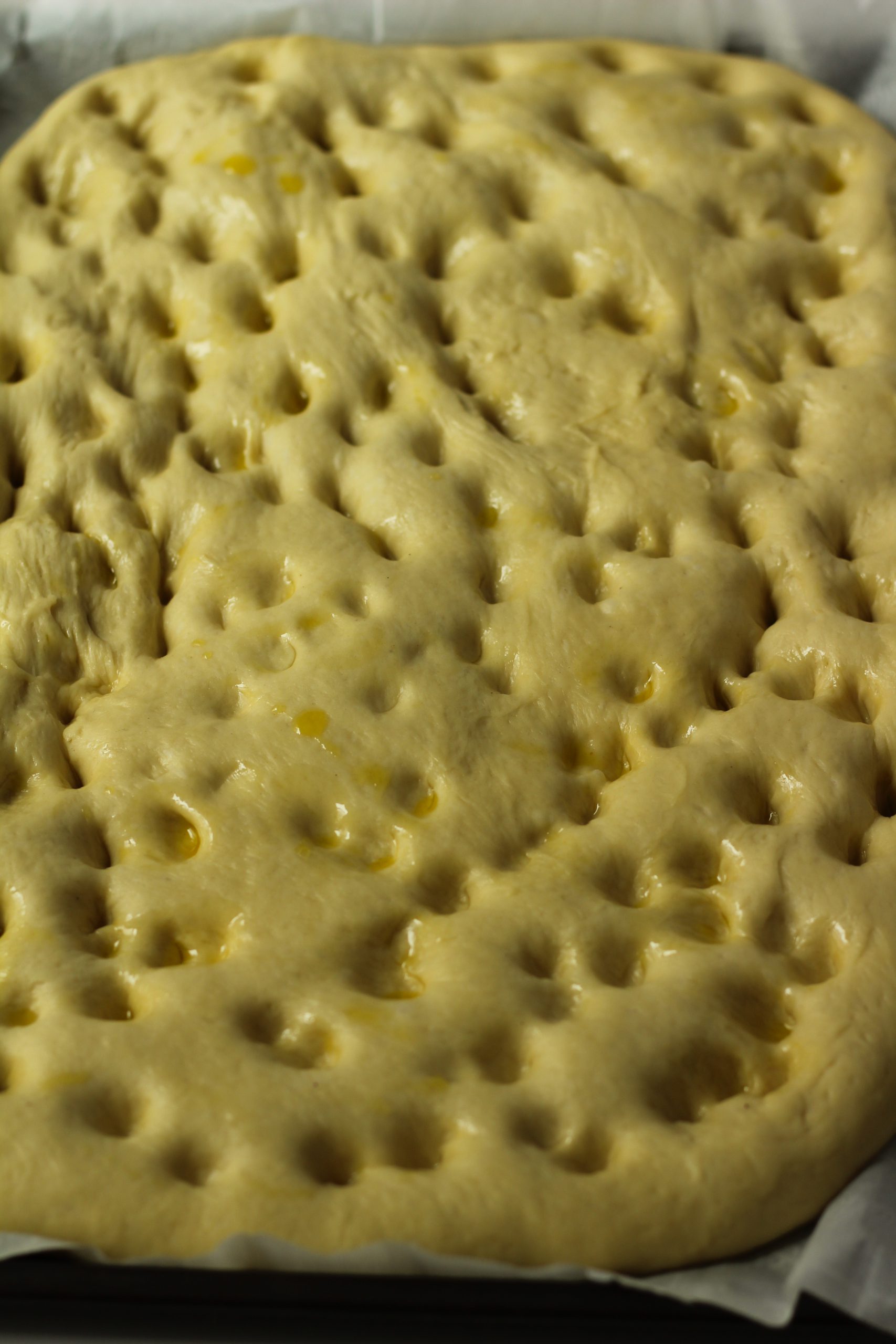 Focaccia dough with finger holes